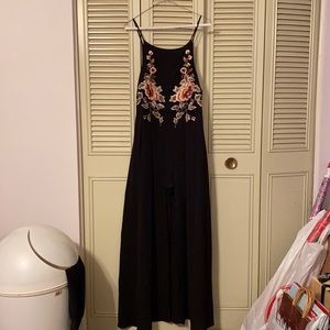 Black Romper with flowing bottom